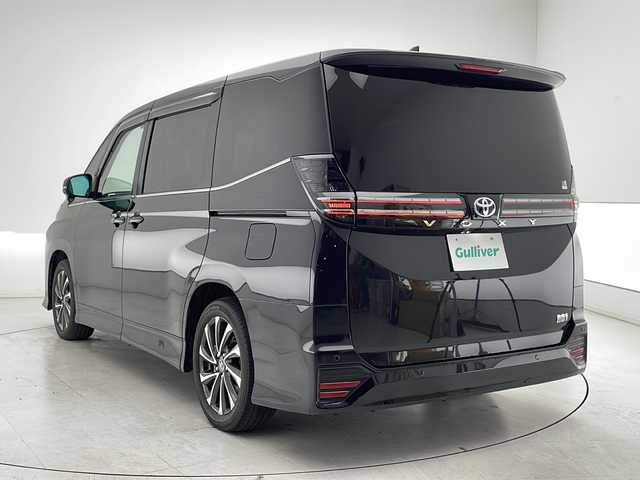 トヨタ ヴォクシー ハイブリッド S－Z 千葉県 2022(令4)年 5.2万km グリッターブラックガラスフレーク パノラミックビューモニター/ブラインドスポットモニター/10.5インチディスプレイナビ/BT/TV/後席14インチフリップダウンモニター/Miracast/HDMI/ステアリングスイッチ/両側パワースライド/100V電源/純正17インチAW/アイドリングストップ/クルーうコントロール/純正ビルトインETC2.0