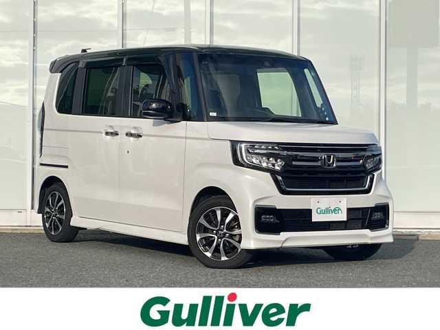 ホンダ Ｎ ＢＯＸ カスタム L 福岡県 2023(令5)年 2.5万km プラチナホワイトパール 9インチカロッツェリアナビ　AVIC-RQ720/【AM/FM/CD/DVD/BT/SD】/バックカメラ/ビルトインETC/リアコーナーセンサー/両側パワースライドドア/前席シートヒーター/レーダークルーズコントロール/アイドリングストップ/LEDヘッドライト/オートライト/衝突軽減ブレーキ/レーンキープアシスト