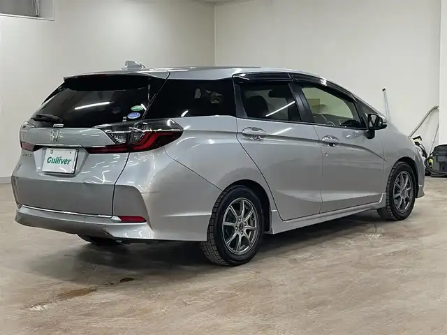 ホンダ シャトル G ホンダセンシング 道央・札幌 2019(令1)年 6.5万km ルナシルバーM ホンダセンシング/・衝突軽減ブレーキ/・レーンキープアシスト/・横滑り防止/レーダークルーズコントロール/社外ディスプレイオーディオ/・Bluetooth/AUX/USB/Apple CarPlay/バックカメラ/ビルトインETC/LEDヘッドライト/LEDフォグランプ/オートライト/プッシュスタート/スマートキー×2/純正フロアマット/純正ドアバイザー/サマータイヤセット積込み/　185/60/15　2019年製　3mm/保証書/取扱説明書