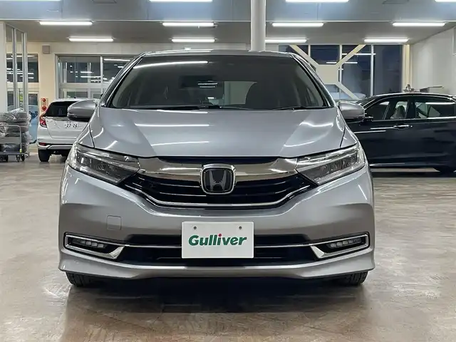 ホンダ シャトル G ホンダセンシング 道央・札幌 2019(令1)年 6.5万km ルナシルバーM ホンダセンシング/・衝突軽減ブレーキ/・レーンキープアシスト/・横滑り防止/レーダークルーズコントロール/社外ディスプレイオーディオ/・Bluetooth/AUX/USB/Apple CarPlay/バックカメラ/ビルトインETC/LEDヘッドライト/LEDフォグランプ/オートライト/プッシュスタート/スマートキー×2/純正フロアマット/純正ドアバイザー/サマータイヤセット積込み/　185/60/15　2019年製　3mm/保証書/取扱説明書