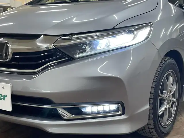 ホンダ シャトル G ホンダセンシング 道央・札幌 2019(令1)年 6.5万km ルナシルバーM ホンダセンシング/・衝突軽減ブレーキ/・レーンキープアシスト/・横滑り防止/レーダークルーズコントロール/社外ディスプレイオーディオ/・Bluetooth/AUX/USB/Apple CarPlay/バックカメラ/ビルトインETC/LEDヘッドライト/LEDフォグランプ/オートライト/プッシュスタート/スマートキー×2/純正フロアマット/純正ドアバイザー/サマータイヤセット積込み/　185/60/15　2019年製　3mm/保証書/取扱説明書