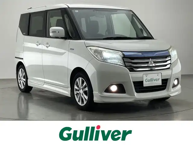 三菱 デリカＤ：２ ハイブリッドSZ ナビパッケージ 愛知県 2018(平30)年 7.9万km ピュアホワイトP 純正ナビ　全方位カメラ　シートヒーター　フルセグＴＶ　ＢＴ　両側パワスラ　ＥＴＣ　デュアルカメラブレーキ　衝突軽減　車線逸脱　クルーズコントロール　ＨＩＤオートライト　フォグランプ　純正フロアマット