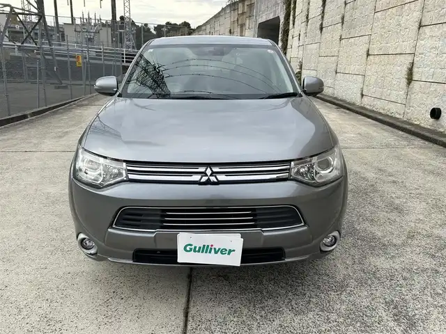 三菱 アウトランダー ＰＨＥＶ G ナビパッケージ 長崎県 2013(平25)年 10万km チタニウムグレーメタリック 純正メモリナビ/（CD/DVD/BT/フルセグ）/バックカメラ/衝突軽減システム/レーンアシスト/レーダークルーズ/ETC/パドルシフト/ハーフレザーシート/ドライブレコーダー/オートライト/ステアリングスイッチ/純正18インチAW/充電ケーブル有り