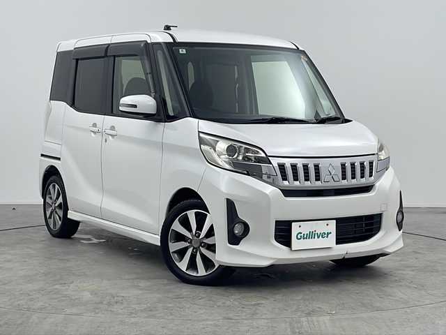 三菱 ｅＫスペース カスタムT 三重県 2014(平26)年 3.7万km シルキーホワイト 禁煙車/純正7インチナビ/・CD/DVD/Bluetooth/iPod/USB/フルセグ/AM/FM/バックカメラ/両側パワースライドドア/HIDヘッドライト/電動格納ミラー/フォグ/純正15インチアルミホイール/運転席シートヒーター