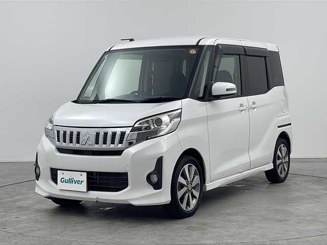 三菱 ｅＫスペース カスタムT 三重県 2014(平26)年 3.7万km シルキーホワイト 禁煙車/純正7インチナビ/・CD/DVD/Bluetooth/iPod/USB/フルセグ/AM/FM/バックカメラ/両側パワースライドドア/HIDヘッドライト/電動格納ミラー/フォグ/純正15インチアルミホイール/運転席シートヒーター