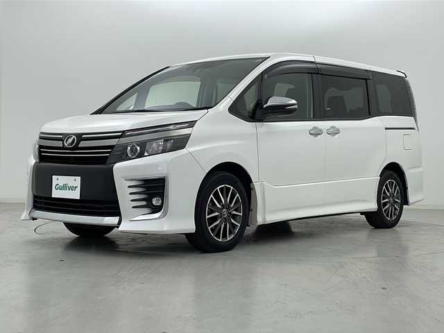 トヨタ ヴォクシー ZS 煌Ⅱ 宮城県 2017(平29)年 4.3万km ホワイトパールクリスタルシャイン 純正フリップダウンモニター/Toyota Safety Sense C/・プリクラッシュセーフティ	/・レーンディパーチャーアラート	/・オートマチックハイビーム	/バックカメラ/純正9型ナビ/・SD.CD.DVD.SD/フルセグTV/両側パワースライドドア/ステアリングスイッチ/革巻ステアリング/LEDヘッドライト/LEDフォグランプ/横滑り防止装置/アイドリングストップ/プッシュスタート/スマートキー/純正16inAW/純正フロアマット/ロールサンシェード/////////