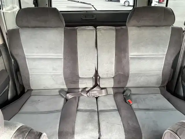 トヨタ ランドクルーザー VX－LTD スペシャルP 岡山県 1994(平6)年 19.8万km ダークグリーンマイカ 社外ナビ/社外ETC/サンルーフ/スペアキー/クルーズコントロール/フルセグTV/純正フロアマット/リフトシート/ドアバイザー/ランバーサポート【D席】/横滑り防止装置