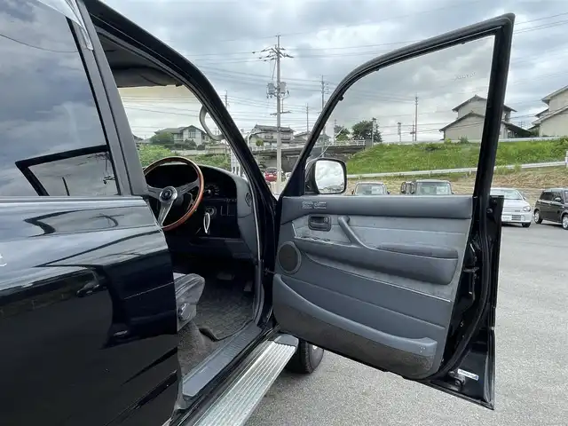 トヨタ ランドクルーザー VX－LTD スペシャルP 岡山県 1994(平6)年 19.8万km ダークグリーンマイカ 社外ナビ/社外ETC/サンルーフ/スペアキー/クルーズコントロール/フルセグTV/純正フロアマット/リフトシート/ドアバイザー/ランバーサポート【D席】/横滑り防止装置