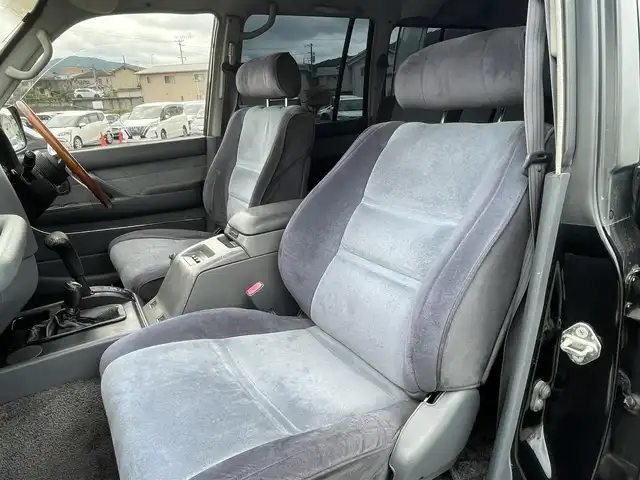 トヨタ ランドクルーザー VX－LTD スペシャルP 岡山県 1994(平6)年 19.8万km ダークグリーンマイカ 社外ナビ/社外ETC/サンルーフ/スペアキー/クルーズコントロール/フルセグTV/純正フロアマット/リフトシート/ドアバイザー/ランバーサポート【D席】/横滑り防止装置