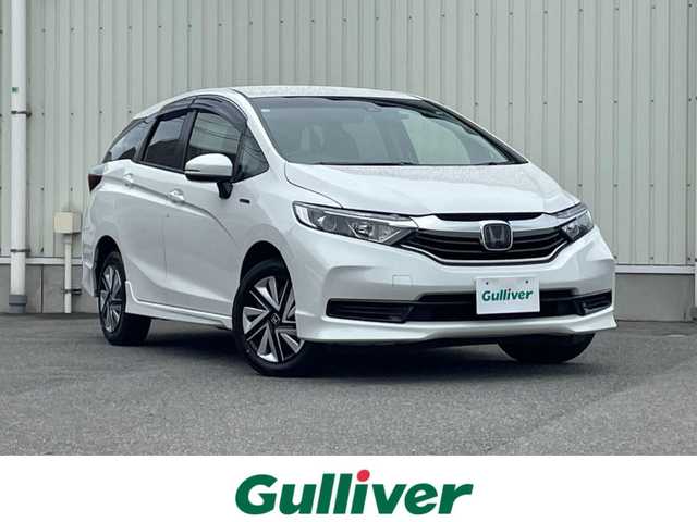 ホンダ シャトル ハイブリッド ホンダセンシング 山形県 2020(令2)年 8.7万km プラチナホワイトパール ４WD/衝突被害軽減/SDナビ/　　【CD　DVD　BT　AUX　USB】/アダプティブクルーズコントロール/横滑り防止装置/レーンキープアシスト/盗難防止装置/フロアマット/ドライブレコーダー/電動格納ミラー/スマートキー×２/ETC