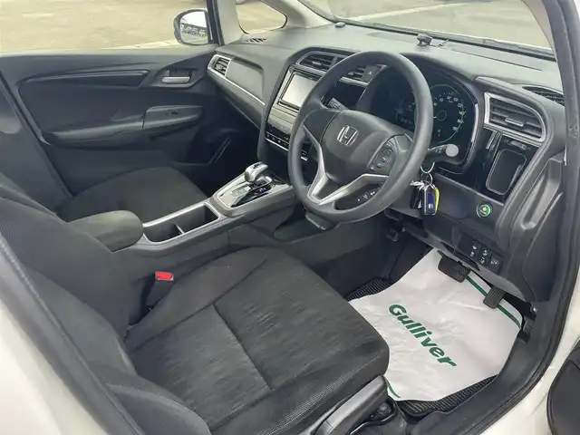ホンダ シャトル ハイブリッド ホンダセンシング 山形県 2020(令2)年 8.7万km プラチナホワイトパール ４WD/衝突被害軽減/SDナビ/　　【CD　DVD　BT　AUX　USB】/アダプティブクルーズコントロール/横滑り防止装置/レーンキープアシスト/盗難防止装置/フロアマット/ドライブレコーダー/電動格納ミラー/スマートキー×２/ETC