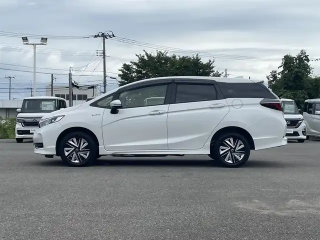 ホンダ シャトル ハイブリッド ホンダセンシング 山形県 2020(令2)年 8.7万km プラチナホワイトパール ４WD/衝突被害軽減/SDナビ/　　【CD　DVD　BT　AUX　USB】/アダプティブクルーズコントロール/横滑り防止装置/レーンキープアシスト/盗難防止装置/フロアマット/ドライブレコーダー/電動格納ミラー/スマートキー×２/ETC