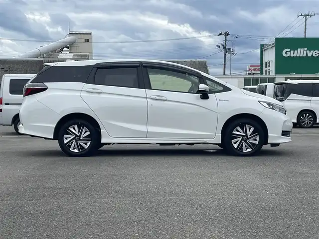 ホンダ シャトル ハイブリッド ホンダセンシング 山形県 2020(令2)年 8.7万km プラチナホワイトパール ４WD/衝突被害軽減/SDナビ/　　【CD　DVD　BT　AUX　USB】/アダプティブクルーズコントロール/横滑り防止装置/レーンキープアシスト/盗難防止装置/フロアマット/ドライブレコーダー/電動格納ミラー/スマートキー×２/ETC