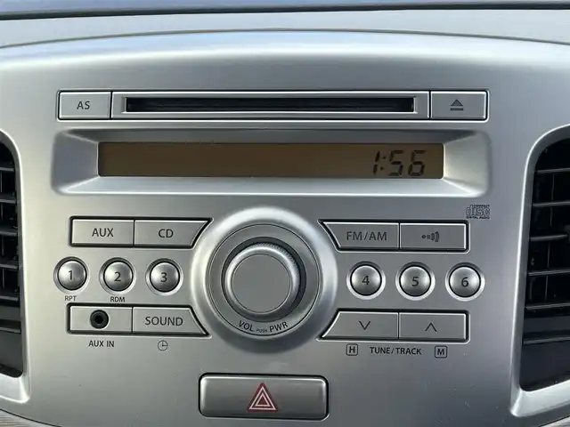 スズキ ワゴンＲ FX 岡山県 2015(平27)年 2.6万km フィズブルーパールメタリック 登録時走行距離：25115km/禁煙車/純正オーディオ/　(CD/AM/FM/AUX)/シートヒーター/ヘッドライトレベライザー/リモコンキー/アイドリングストップ/純正ホイールキャップ/ドアバイザー/電動格納ミラー/純正フロアマット/横滑防止装置/盗難防止装置