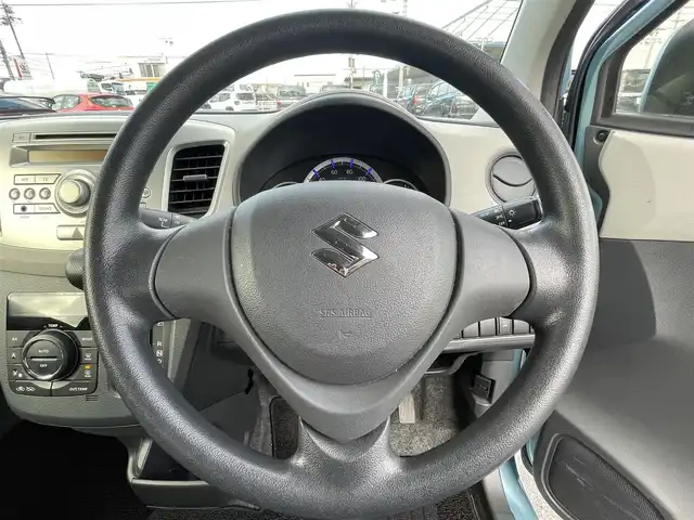 スズキ ワゴンＲ FX 岡山県 2015(平27)年 2.6万km フィズブルーパールメタリック 登録時走行距離：25115km/禁煙車/純正オーディオ/　(CD/AM/FM/AUX)/シートヒーター/ヘッドライトレベライザー/リモコンキー/アイドリングストップ/純正ホイールキャップ/ドアバイザー/電動格納ミラー/純正フロアマット/横滑防止装置/盗難防止装置