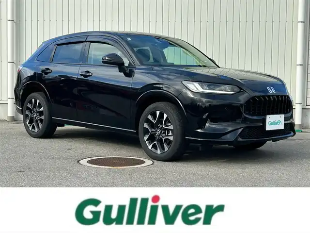 ホンダ ＺＲ－Ｖ ハイブリッド e:HEV Z 富山県 2022(令4)年 2万km クリスタルブラックパール 4WD/純正SDナビ/(AM/FM/BT/USB)/フルセグTV/カメラ(バック、全方位)/Honda CONNECT/BOSEサウンド/ブラインドスポットモニター/ワイヤレス充電器/レーダークルーズコントロール/衝突軽減システム/レーンキープアシスト/オートマチックハイビーム/コーナーセンサー/ダウンヒルアシストコントロール/後退出庫サポート/パドルシフト/ETC2.0/ドライブレコーダー　前後/シートヒーター　運転席+助手席/パワーシート　運転席+助手席/レザーシート/電動リアゲート/純正AW/フロアマット純正/スマートキー×2/取扱説明書/保証書