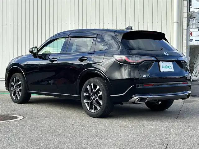 ホンダ ＺＲ－Ｖ ハイブリッド e:HEV Z 富山県 2022(令4)年 2万km クリスタルブラックパール 4WD/純正SDナビ/(AM/FM/BT/USB)/フルセグTV/カメラ(バック、全方位)/Honda CONNECT/BOSEサウンド/ブラインドスポットモニター/ワイヤレス充電器/レーダークルーズコントロール/衝突軽減システム/レーンキープアシスト/オートマチックハイビーム/コーナーセンサー/ダウンヒルアシストコントロール/後退出庫サポート/パドルシフト/ETC2.0/ドライブレコーダー　前後/シートヒーター　運転席+助手席/パワーシート　運転席+助手席/レザーシート/電動リアゲート/純正AW/フロアマット純正/スマートキー×2/取扱説明書/保証書