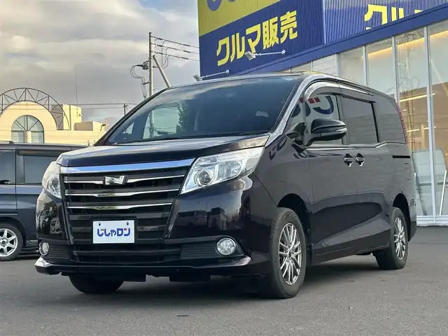 トヨタ ノア X 道北・旭川 2014(平26)年 11.2万km ボルドーマイカメタリック (株)IDOMが運営する【じしゃロン旭川店】の自社ローン専用車両になります。こちらは現金またはオートローンご利用時の価格です。自社ローンご希望の方は別途その旨お申付け下さい・/　/・社外CDオーディオ/・ETC/・ドライブレコーダー/・片側パワースライドドア/・電動格納ウィンカーミラー/・リモコンキー1個/・フォグランプ/・積込スタッドレス 社外AW195/65R15/・取扱説明書