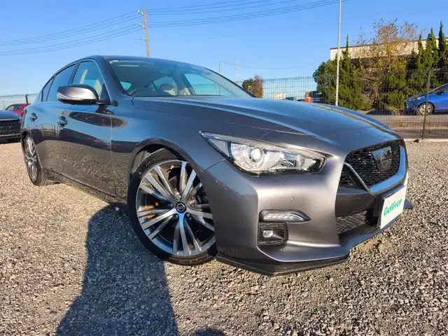 日産 スカイライン GT タイプSP 愛知県 2020(令2)年 1.8万km ダークメタルグレー ワンオーナー/純正8型ナビ/フルセグTV/アラウンドビューモニター/ビルトインETC2.0/ドライブレコーダー/レーダークルーズコントロール/フロント/バックソナー/全方位運転支援システム/・エマージェンシーブレーキ/・車線逸脱防止支援システム/・踏み間違い衝突防止アシスト/・後側方衝突防止支援システム/・後側方車両検知警報/ツインターボ/ステアリング連動LEDヘッドランプ/LEDフロントフォグランプ/革巻きステアリング/パドルシフト/ベージュ革シート/前席パワーシート/シートヒーター/純正19インチアルミホイール/ローダウン/HKS車高調/スマートキー/プッシュエンジンスターター/禁煙車