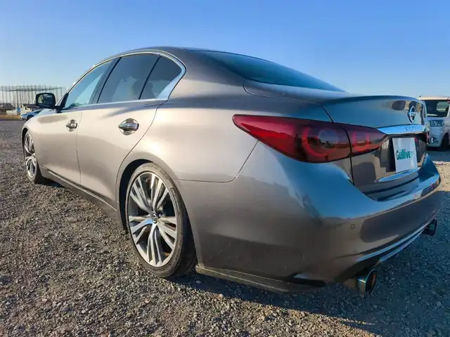 日産 スカイライン GT タイプSP 愛知県 2020(令2)年 1.8万km ダークメタルグレー ワンオーナー/純正8型ナビ/フルセグTV/アラウンドビューモニター/ビルトインETC2.0/ドライブレコーダー/レーダークルーズコントロール/フロント/バックソナー/全方位運転支援システム/・エマージェンシーブレーキ/・車線逸脱防止支援システム/・踏み間違い衝突防止アシスト/・後側方衝突防止支援システム/・後側方車両検知警報/ツインターボ/ステアリング連動LEDヘッドランプ/LEDフロントフォグランプ/革巻きステアリング/パドルシフト/ベージュ革シート/前席パワーシート/シートヒーター/純正19インチアルミホイール/ローダウン/HKS車高調/スマートキー/プッシュエンジンスターター/禁煙車