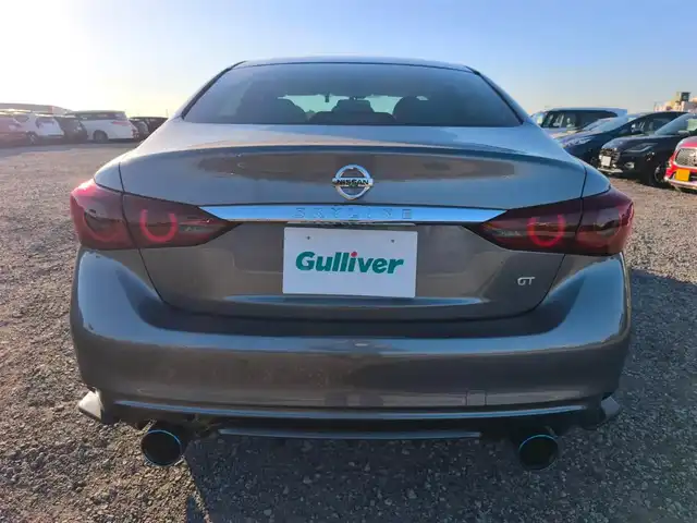 日産 スカイライン GT タイプSP 愛知県 2020(令2)年 1.8万km ダークメタルグレー ワンオーナー/純正8型ナビ/フルセグTV/アラウンドビューモニター/ビルトインETC2.0/ドライブレコーダー/レーダークルーズコントロール/フロント/バックソナー/全方位運転支援システム/・エマージェンシーブレーキ/・車線逸脱防止支援システム/・踏み間違い衝突防止アシスト/・後側方衝突防止支援システム/・後側方車両検知警報/ツインターボ/ステアリング連動LEDヘッドランプ/LEDフロントフォグランプ/革巻きステアリング/パドルシフト/ベージュ革シート/前席パワーシート/シートヒーター/純正19インチアルミホイール/ローダウン/HKS車高調/スマートキー/プッシュエンジンスターター/禁煙車