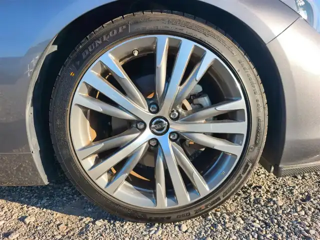 日産 スカイライン GT タイプSP 愛知県 2020(令2)年 1.8万km ダークメタルグレー ワンオーナー/純正8型ナビ/フルセグTV/アラウンドビューモニター/ビルトインETC2.0/ドライブレコーダー/レーダークルーズコントロール/フロント/バックソナー/全方位運転支援システム/・エマージェンシーブレーキ/・車線逸脱防止支援システム/・踏み間違い衝突防止アシスト/・後側方衝突防止支援システム/・後側方車両検知警報/ツインターボ/ステアリング連動LEDヘッドランプ/LEDフロントフォグランプ/革巻きステアリング/パドルシフト/ベージュ革シート/前席パワーシート/シートヒーター/純正19インチアルミホイール/ローダウン/HKS車高調/スマートキー/プッシュエンジンスターター/禁煙車