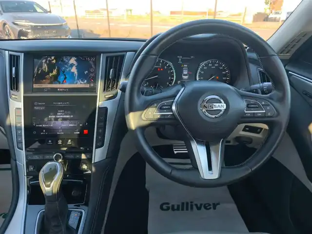 日産 スカイライン GT タイプSP 愛知県 2020(令2)年 1.8万km ダークメタルグレー ワンオーナー/純正8型ナビ/フルセグTV/アラウンドビューモニター/ビルトインETC2.0/ドライブレコーダー/レーダークルーズコントロール/フロント/バックソナー/全方位運転支援システム/・エマージェンシーブレーキ/・車線逸脱防止支援システム/・踏み間違い衝突防止アシスト/・後側方衝突防止支援システム/・後側方車両検知警報/ツインターボ/ステアリング連動LEDヘッドランプ/LEDフロントフォグランプ/革巻きステアリング/パドルシフト/ベージュ革シート/前席パワーシート/シートヒーター/純正19インチアルミホイール/ローダウン/HKS車高調/スマートキー/プッシュエンジンスターター/禁煙車