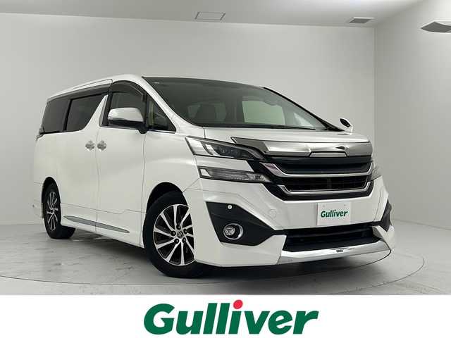 トヨタ ヴェルファイア V 大阪府 2016(平28)年 7.2万km ホワイトパールクリスタルシャイン モデリスタフルエアロ/ALPINE製フリップダウンモニター/ALPINE製9インチナビ/　  CD/DVD/BT/TV/バックカメラ/両側パワースライドドア/LEDヘッドライト/運転席パワーシート/運転席シートヒーター/革張シートカバー/ウッドコンビステアリング/純正17インチアルミホイール/オートホールド/リバース連動ミラー/フロアマット/純正ビルトインETC/スマートキー