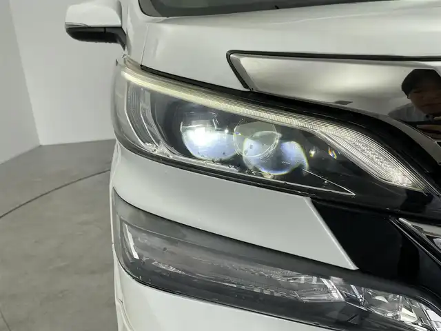 トヨタ ヴェルファイア V 愛知県 2016(平28)年 7.2万km ホワイトパールクリスタルシャイン ALPINEナビ/（CD/DVD/BT/フルセグ）/ALPINEフリップダウンモニター/モデリスタエアロ/モデリスタグリル/ETC/両側パワースライドドア/パーキングセンサー/運転席パワーシート/シートカバー/純正AW/ドアバイザー/社外フロアマット/フォグランプ