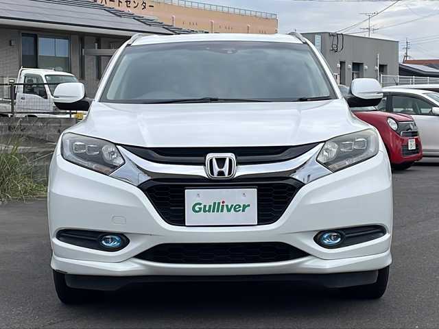 ホンダ ヴェゼル ハイブリッド Z 鹿児島県 2015(平27)年 10.3万km ホワイトオーキッドパール インターナビ/フルセグ/バックカメラ/Bluetooth/ビルトインETC/ステアリングスイッチ/前席シートヒーター/前方ドライブレコーダー/パドルシフト/クルーズコントロール/衝突軽減ブレーキ/トノカバー/スマートキー2本/純正フロアマット/LEDヘッドライト/フロントフォグランプ/オートライト