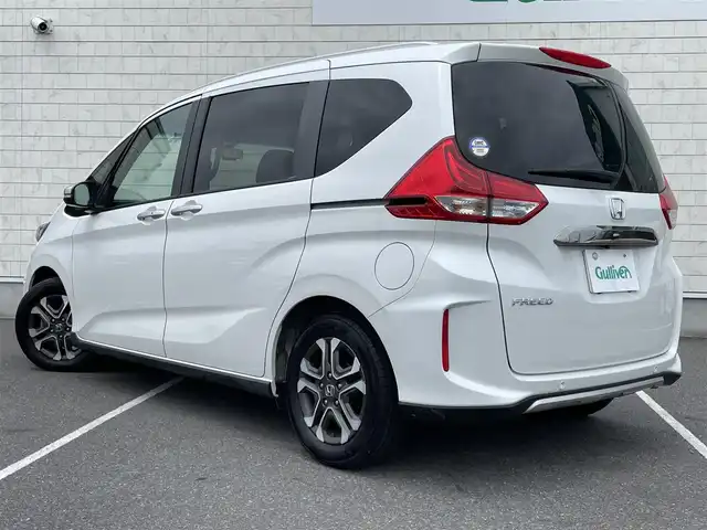 ホンダ フリード クロスター ホンダセンシング 栃木県 2021(令3)年 2.3万km プラチナホワイトパール ワンオーナー /禁煙車/純正9インチナビ/（フルセグTV/BT/CD/DVD/SD）/バックモニター/レーダークルーズコントロール/衝突軽減システム/レーンキープアシスト/コーナーセンサー/両側パワースライドドア/ルーフレール /ハーフレザーシート/前席シートヒーター/前後ドライブレコーダー/スマートキー/オートライト/LEDヘッドライト/フォグランプ/ビルドインETC/純正15インチAW/保証書/取説