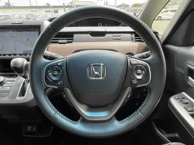 ホンダ フリード クロスター ホンダセンシング 栃木県 2021(令3)年 2.3万km プラチナホワイトパール ワンオーナー /禁煙車/純正9インチナビ/（フルセグTV/BT/CD/DVD/SD）/バックモニター/レーダークルーズコントロール/衝突軽減システム/レーンキープアシスト/コーナーセンサー/両側パワースライドドア/ルーフレール /ハーフレザーシート/前席シートヒーター/前後ドライブレコーダー/スマートキー/オートライト/LEDヘッドライト/フォグランプ/ビルドインETC/純正15インチAW/保証書/取説