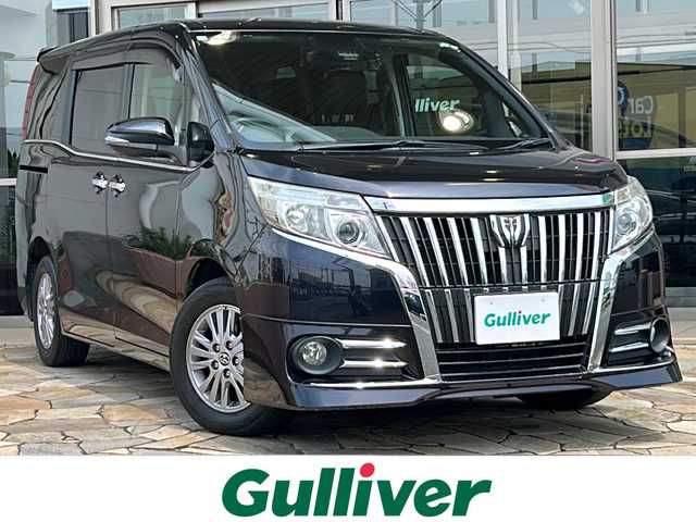 トヨタ エスクァイア Gi 静岡県 2016(平28)年 13.4万km スパークリングブラックパールクリスタルシャイン 社外SDナビ/・CD/・DVD/・フルセグTV/・Bluetooth/・AM/・FM/主要装備/・衝突軽減/・レーンキープ/・クルコン/・バックカメラ/・両側パワスラ/・オートハイビーム/・D+N席シートヒーター/・レザーシート/・ビルトインETC/・前方ドラレコ/・純正フロアマット/・純正アルミホイール/・スマートキー/・プッシュスタート