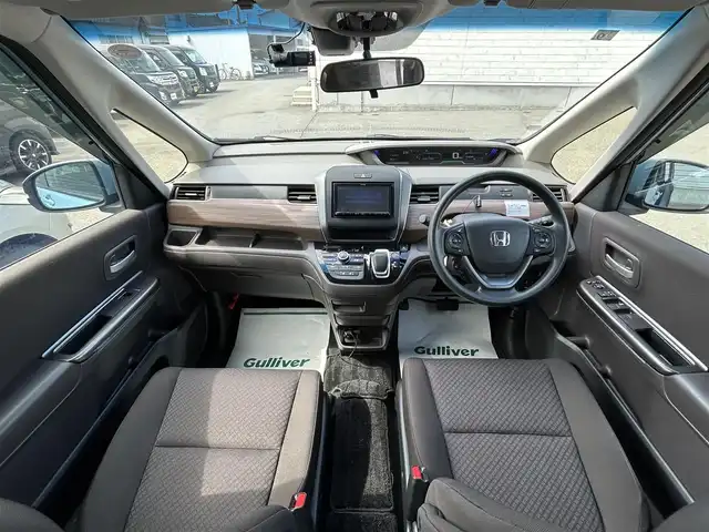 ホンダ フリード ハイブリット G ホンダセンシング 山形県 2020(令2)年 5.7万km シーグラスブルーパール ４WD/SDナビ/フルセグTV/AM/FM/iPod/USB/SD/Bluetooth/クルーズコントロール/ホンダセンシング/両側パワースライドドア/衝突軽減ブレーキ/横滑り防止装置/シートヒーター/ドライブレコーダー/バックカメラ/盗難防止装置/ダブルエアバック/純正マット/純正バイザー/AUTOライト/LEDライト/スマートキー/保証書