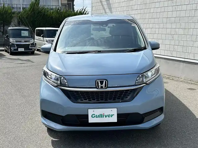 ホンダ フリード ハイブリット G ホンダセンシング 山形県 2020(令2)年 5.7万km シーグラスブルーパール ４WD/SDナビ/フルセグTV/AM/FM/iPod/USB/SD/Bluetooth/クルーズコントロール/ホンダセンシング/両側パワースライドドア/衝突軽減ブレーキ/横滑り防止装置/シートヒーター/ドライブレコーダー/バックカメラ/盗難防止装置/ダブルエアバック/純正マット/純正バイザー/AUTOライト/LEDライト/スマートキー/保証書