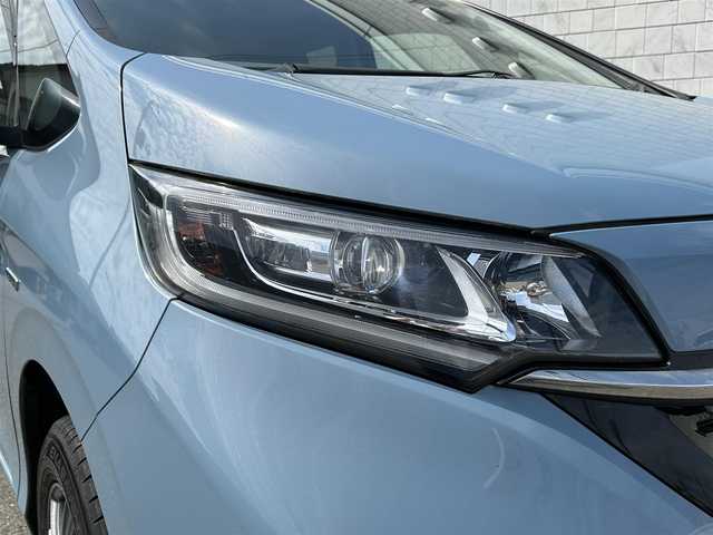 ホンダ フリード ハイブリット G ホンダセンシング 山形県 2020(令2)年 5.7万km シーグラスブルーパール ４WD/SDナビ/フルセグTV/AM/FM/iPod/USB/SD/Bluetooth/クルーズコントロール/ホンダセンシング/両側パワースライドドア/衝突軽減ブレーキ/横滑り防止装置/シートヒーター/ドライブレコーダー/バックカメラ/盗難防止装置/ダブルエアバック/純正マット/純正バイザー/AUTOライト/LEDライト/スマートキー/保証書