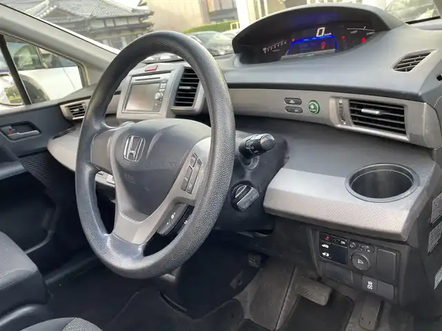 ホンダ フリード ハイブリット ジャストセレクション 宮崎県 2012(平24)年 9万km プレミアムブラキッシュパール /ナビ（VXM-128VS）//ワンセグ/CD/DVD//片側スライド//バックカメラ//ウィンカーミラー//ETC//オートライト//社外アルミホイール//クルーズコントロール//取扱説明書//保証書