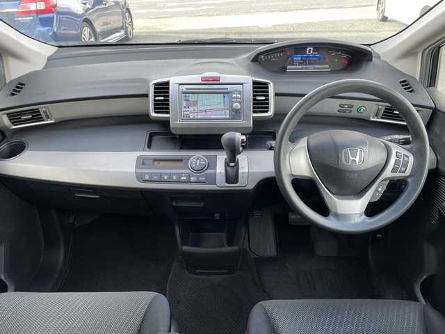 ホンダ フリード ハイブリット ジャストセレクション 愛知県 2012(平24)年 9万km プレミアムブラキッシュパール /ナビ（VXM-128VS）//ワンセグ/CD/DVD//片側スライド//バックカメラ//ウィンカーミラー//ETC//オートライト//社外アルミホイール//クルーズコントロール//取扱説明書//保証書