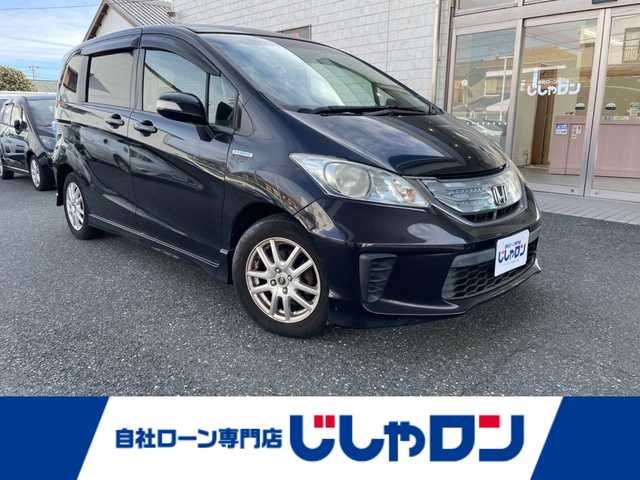 ホンダ フリード ハイブリット ジャストセレクション 愛知県 2012(平24)年 9万km プレミアムブラキッシュパール /ナビ（VXM-128VS）//ワンセグ/CD/DVD//片側スライド//バックカメラ//ウィンカーミラー//ETC//オートライト//社外アルミホイール//クルーズコントロール//取扱説明書//保証書