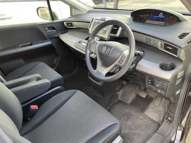 ホンダ フリード ハイブリット ジャストセレクション 愛知県 2012(平24)年 9万km プレミアムブラキッシュパール /ナビ（VXM-128VS）//ワンセグ/CD/DVD//片側スライド//バックカメラ//ウィンカーミラー//ETC//オートライト//社外アルミホイール//クルーズコントロール//取扱説明書//保証書