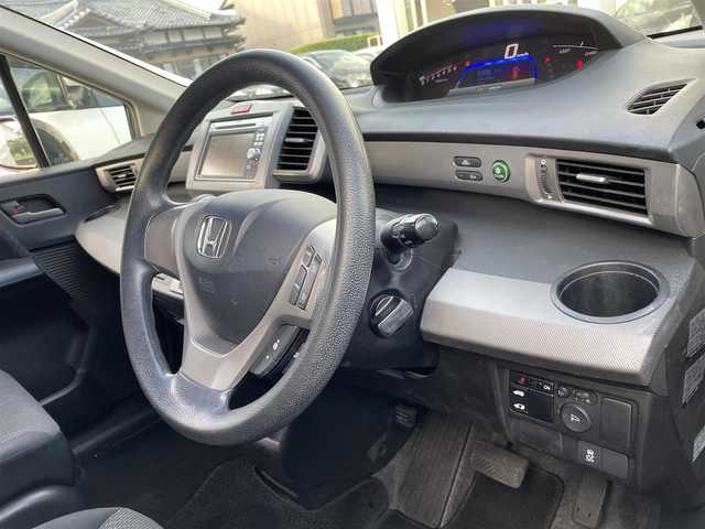 ホンダ フリード ハイブリット ジャストセレクション 愛知県 2012(平24)年 9万km プレミアムブラキッシュパール /ナビ（VXM-128VS）//ワンセグ/CD/DVD//片側スライド//バックカメラ//ウィンカーミラー//ETC//オートライト//社外アルミホイール//クルーズコントロール//取扱説明書//保証書