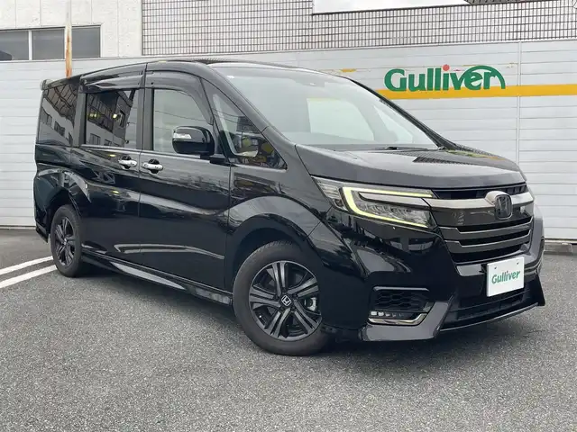 ホンダ ステップワゴン スパーダ eHEV G EXホンダS 埼玉県 2020(令2)年 10.7万km プレミアムスパークルブラックパール ・ワンオーナー/・純正ナビ（VXM-207VFNi)(CD/DVD/フルセグ/BT)/・バックカメラ/・両側パワースライドドア/・前席シートヒーター/・衝突軽減ブレーキシステム/・ETC2.0/・純正16インチアルミホイール/・ハーフレザーシート/・新車保証書