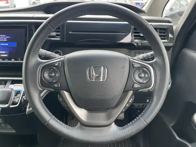 ホンダ ステップワゴン スパーダ eHEV G EXホンダS 埼玉県 2020(令2)年 10.7万km プレミアムスパークルブラックパール ・ワンオーナー/・純正ナビ（VXM-207VFNi)(CD/DVD/フルセグ/BT)/・バックカメラ/・両側パワースライドドア/・前席シートヒーター/・衝突軽減ブレーキシステム/・ETC2.0/・純正16インチアルミホイール/・ハーフレザーシート/・新車保証書