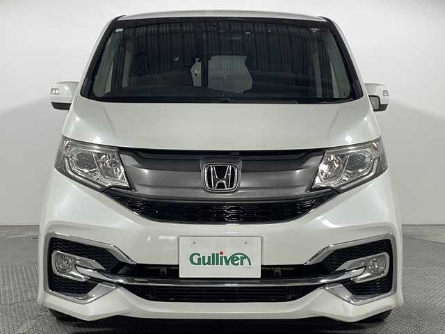 ホンダ ステップワゴン スパーダ ホンダセンシング 広島県 2017(平29)年 4.1万km ホワイトオーキッドパール 禁煙/社外ナビ/後席モニター/バックカメラ/レーダークルーズコントロール/両側パワースライドドア/レーンキープアシスト/オートライト/踏み間違い防止/ビルトインＥＴＣ２．０/スペアキー/パドルシフト