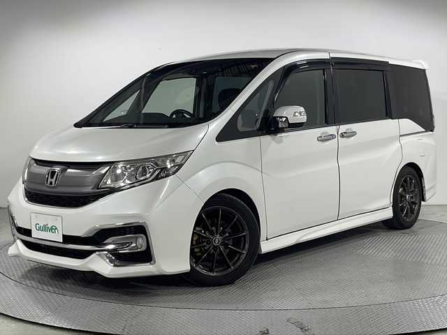 ホンダ ステップワゴン スパーダ ホンダセンシング 広島県 2017(平29)年 4.1万km ホワイトオーキッドパール 禁煙/社外ナビ/後席モニター/バックカメラ/レーダークルーズコントロール/両側パワースライドドア/レーンキープアシスト/オートライト/踏み間違い防止/ビルトインＥＴＣ２．０/スペアキー/パドルシフト