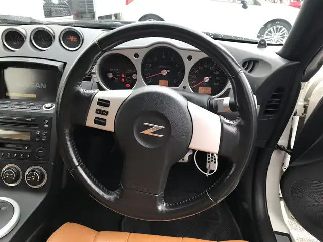 日産 フェアレディ Ｚ バージョンST 富山県 2004(平16)年 6.3万km ホワイトパール BOSEサウンド/カーオーディオ/レザーシート/パワーシート/シートヒーター/革巻きステアリング/リモコンキー/ETC/パワーウインドウ/純正18インチAW