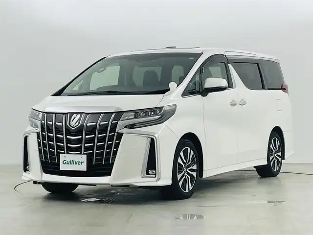 トヨタ アルファード S Cパッケージ 福島県 2021(令3)年 5.7万km ホワイトパールクリスタルシャイン ツインルーフ　/トヨタセーフティーセンス　/・PCS/・ACC/・LTA/・AHB/・AFS/・BSM/純正フリップダウンモニター　/純正９インチディスプレイオーディオナビキット付　/【AM/FM/Bluetooth/フルセグ】/ＥＴＣ　/バックカメラ　/デジタルインナーミラー　/パワーバックドア　/ドライブレコーダー/シートヒーター/・シートクーラー/・ハンドルヒーター/・パワーシート/・メモリシート/プッシュスタート/・スマートキー/・スペアキー/LEDライト/・オートライト/・フォグライト/置くだけ充電/電子パーキング　/・ブレーキホールド/オットマン/純正フロアマット