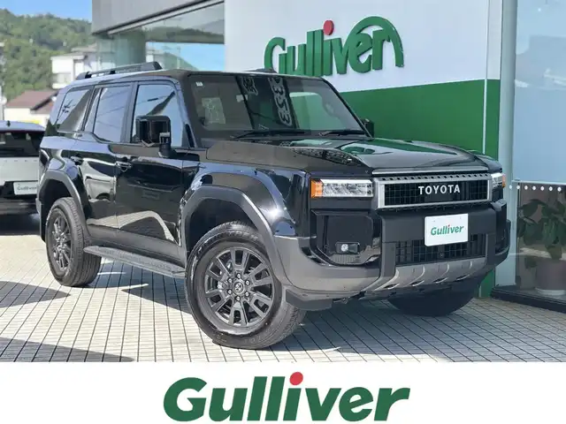 トヨタ ランドクルーザー ２５０ VX 京都府 2024(令6)年 0.6万km ブラック ワンオーナー車/トヨタセーフティセンス/・プリクラッシュセーフティ/・レーンディバーチャーアラート/・オートマチックハイビーム/・プロアクティブドライビングアシスト/・レーダークルーズコントロール/・ロードサインアシスト/純正12.3インチメモリーナビ、地デジ、Bluetooth/USB端子、HDMI端子/パノラミックビューモニター/運転席パワーシート/前席エアーシート/シートヒーター/デジタルインナーミラ/ビルトイン2.0ETC/ハンドルヒーター/LEDヘッドランプ/純正18インチアルミホイール/スペアキー