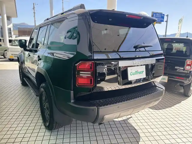 トヨタ ランドクルーザー ２５０ VX 京都府 2024(令6)年 0.6万km ブラック ワンオーナー車/トヨタセーフティセンス/・プリクラッシュセーフティ/・レーンディバーチャーアラート/・オートマチックハイビーム/・プロアクティブドライビングアシスト/・レーダークルーズコントロール/・ロードサインアシスト/純正12.3インチメモリーナビ、地デジ、Bluetooth/USB端子、HDMI端子/パノラミックビューモニター/運転席パワーシート/前席エアーシート/シートヒーター/デジタルインナーミラ/ビルトイン2.0ETC/ハンドルヒーター/LEDヘッドランプ/純正18インチアルミホイール/スペアキー