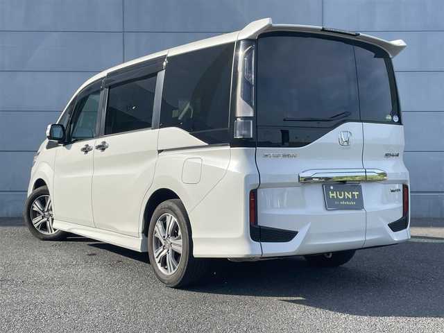 ホンダ ステップワゴン スパーダ eHEV G EXホンダS 千葉県 2021(令3)年 2.2万km プラチナホワイトパール 10インチ純正メーカーOPナビ /全方位カメラ /Bluetooth接続あり /フルセグTV /CD/DVD再生あり /ETC /シートヒーター /両側パワースライドドア /純正後席モニター /追従型クルーズコントロール